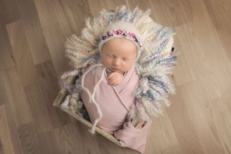 Newborn baby in wrap